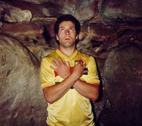 Wayne in a Druidic pose inside West Kennet Longbarrow
