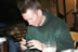 Aidan looking exactly the same as twenty years ago, only it would have been a rolly not a phone then (153kb)